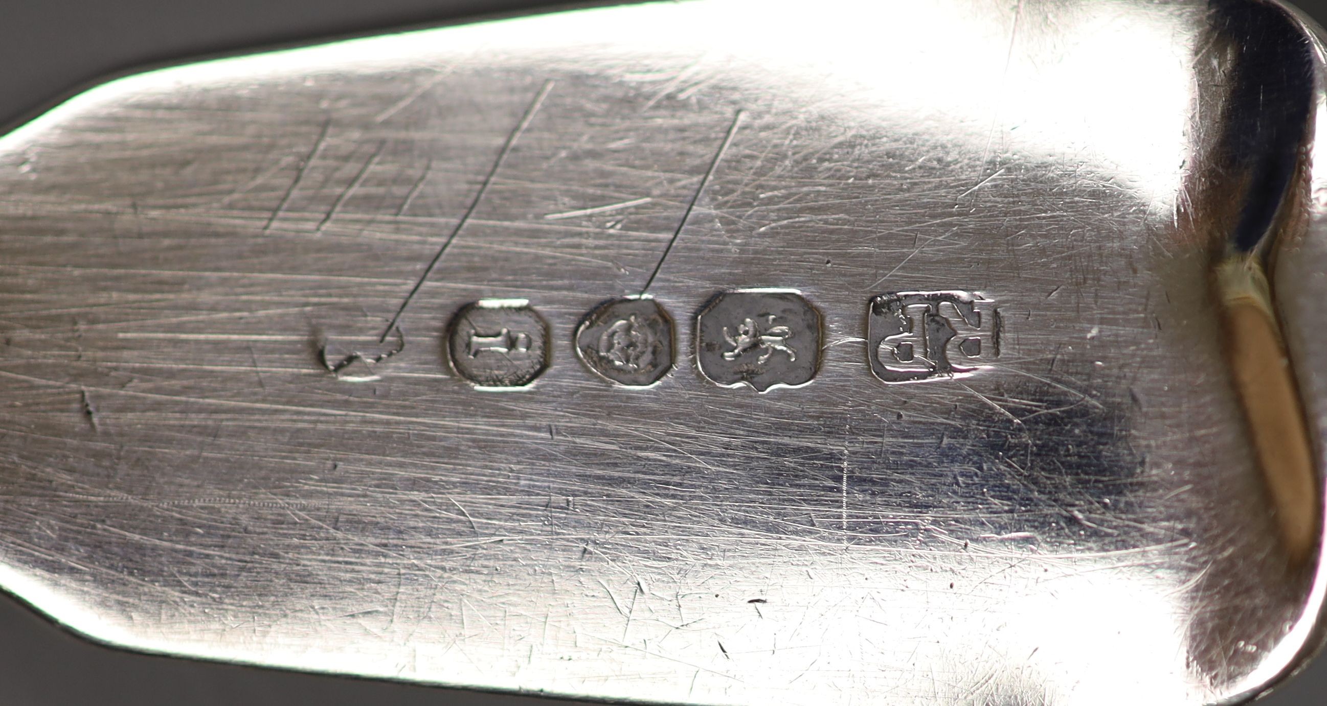 A George IV silver fiddle pattern fish slice, Robert Peppin, London, 1824, 28cm, 128 grams.